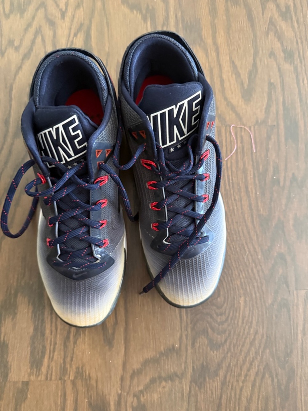 Nike men’s Navy and Red Lace-Up Sneakers